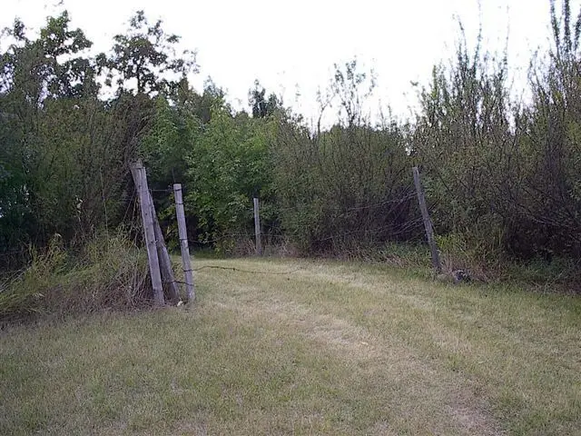 Fence entrance to the Mitchell cottage